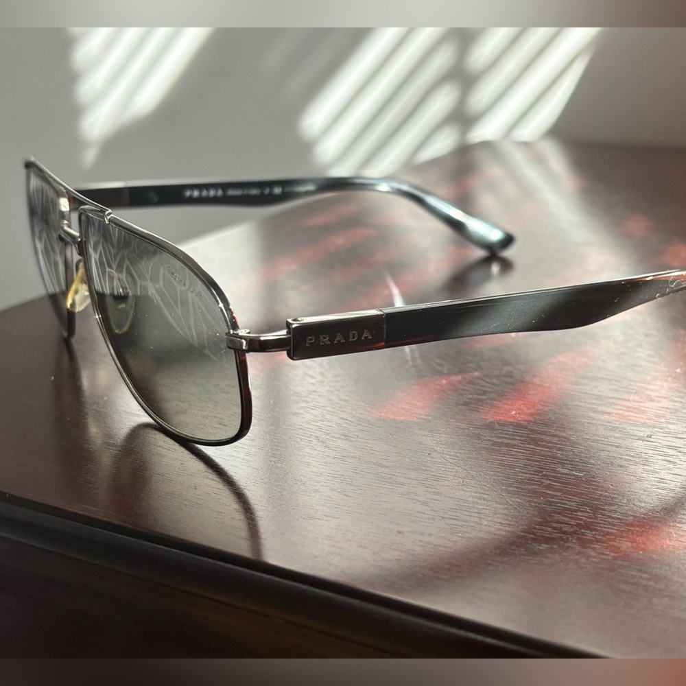 Men’s Prada sunglasses.